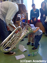 A child looking into a tuba（Centre for Children at Christopher
>> Place）